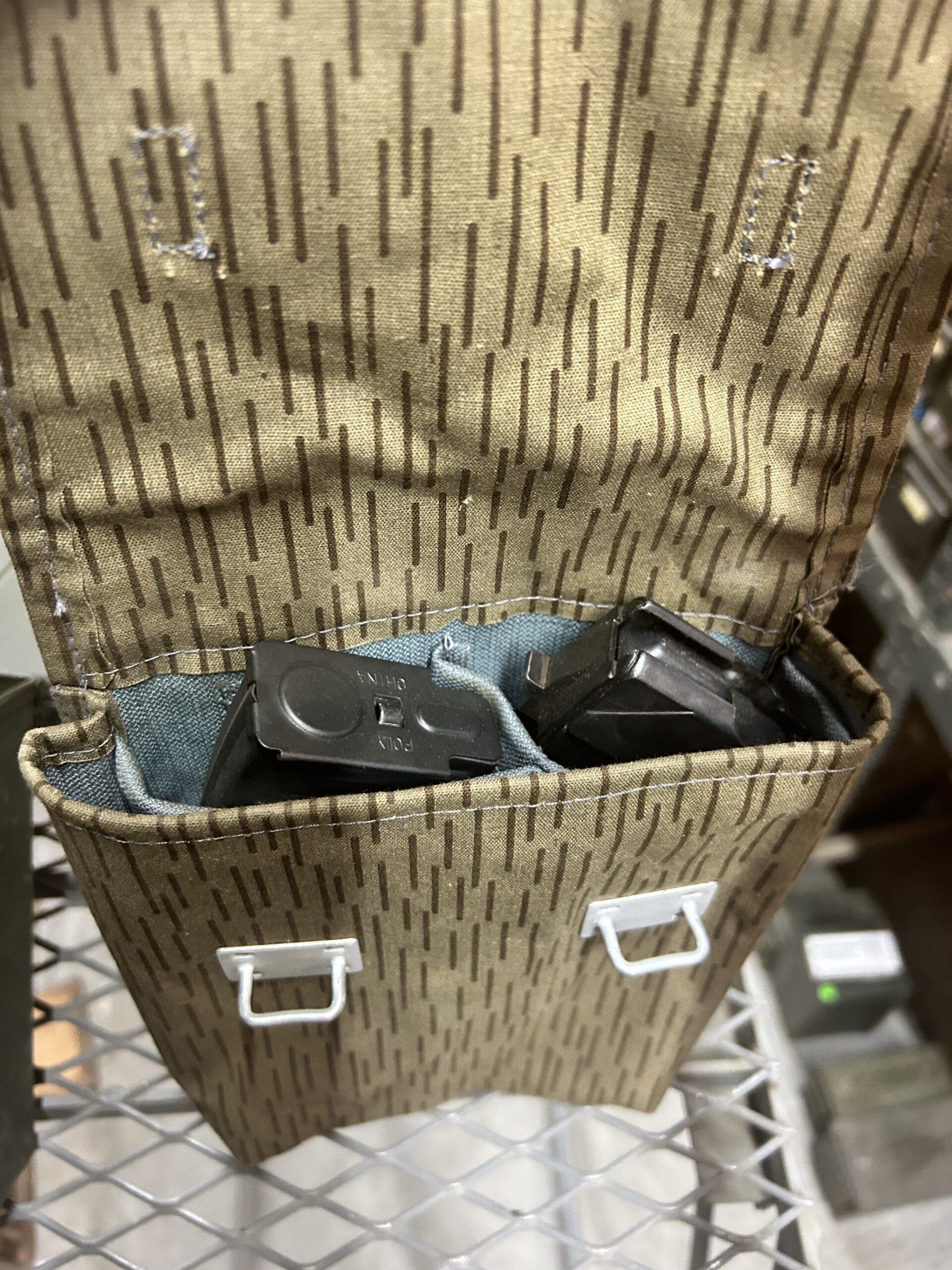 Ak-47 mag pouch and 2 thirty round mags.