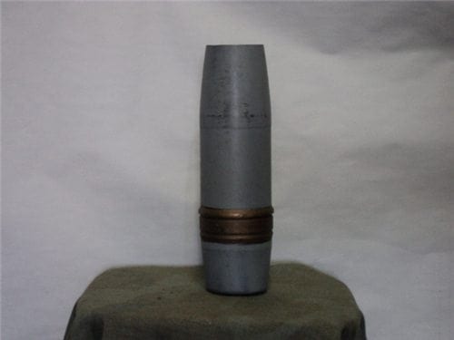 3 inch x 50 inert bondo'd and painted projectile. (not recommended for shooting)