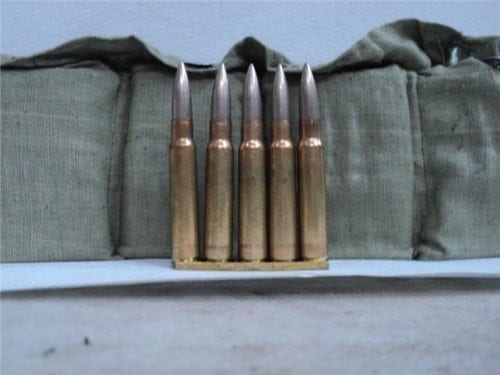 8mm Mauser ammo in 5 round stripper clips and 70 round bandoleer.