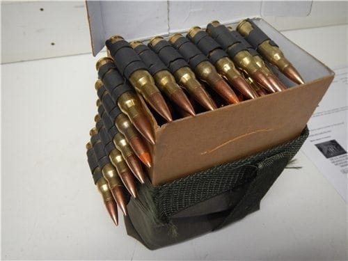 308 ball/Tracer ammo. 4 to 1 in a 100 round linked belt, bandoleer and cardboard box.
