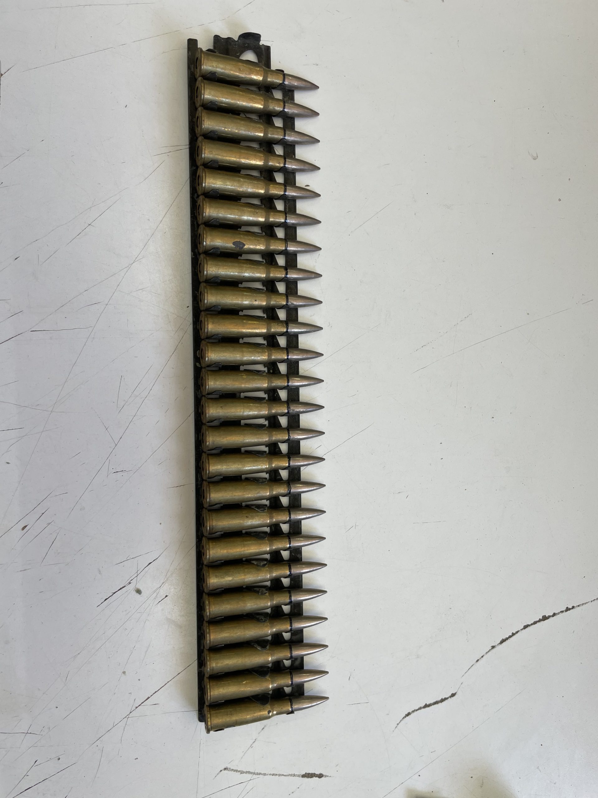 8MM Mauser Label ball ammo in 24 round machine gun tray.